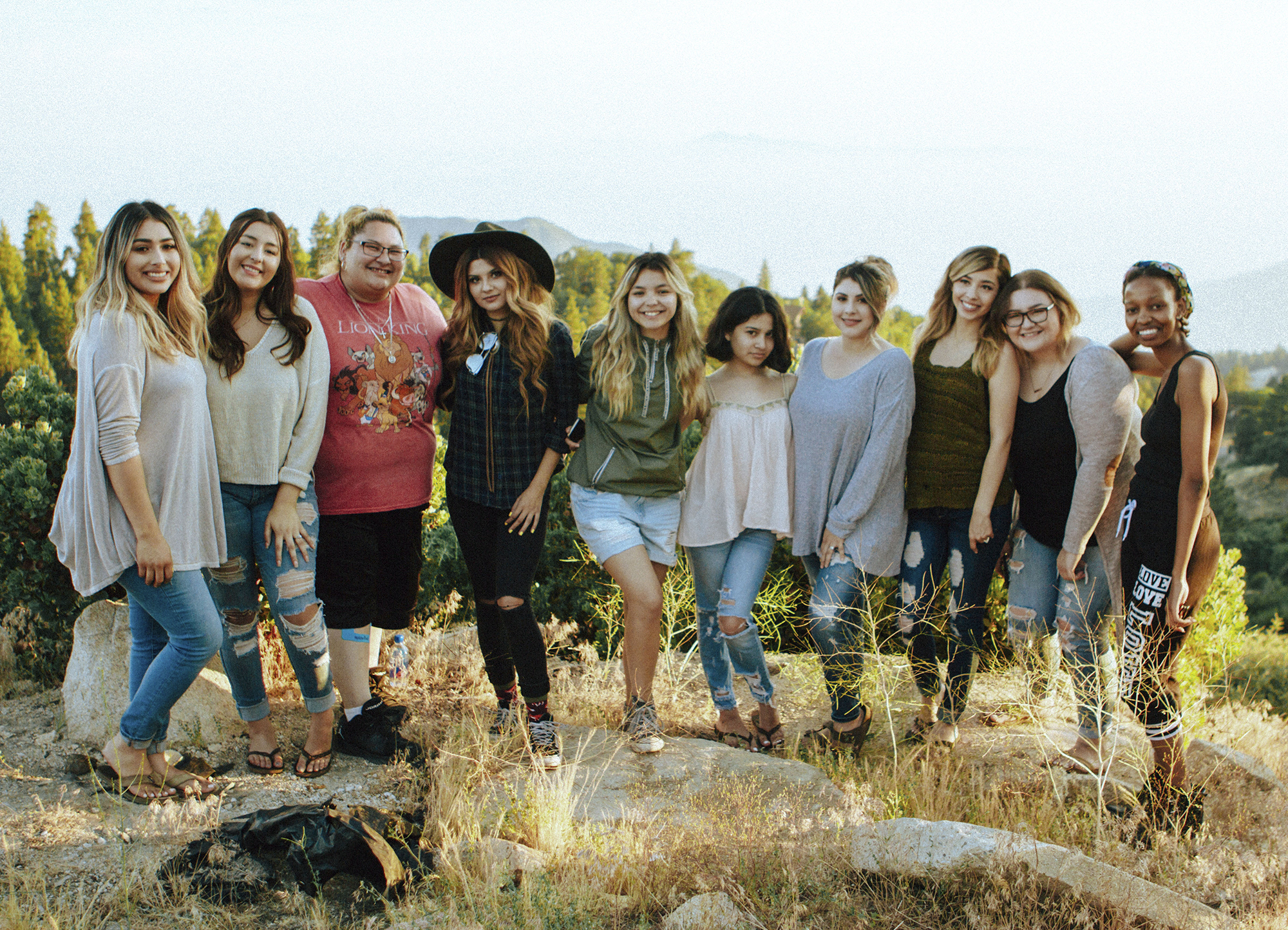 Group of happy people at outdoor retreat.